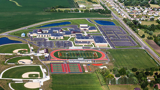 Aerial view of a campus in a rural area. 