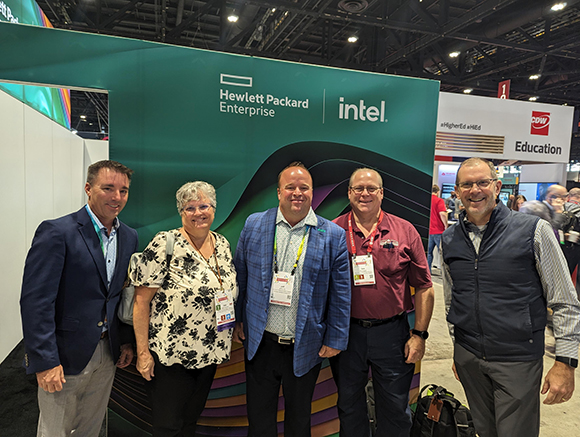 Deb Kidwell, MHEC director of technology initiatives, (pictured second from left) in the EDUCAUSE exhibit hall with HPE representatives and Technologies Executive Committee members.