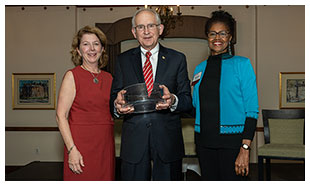 David Eisler receives MHEC's Phillip Sirotkin Award . Pictured with President Susan Heegaard (left) and KS Rep. Barbara Ballard (right)