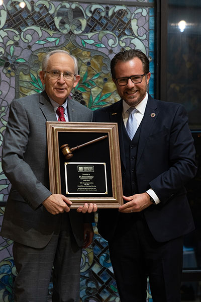 Dr. David Eisler receives plaque. Pictured with Rep. Rick Carfagna (OH)